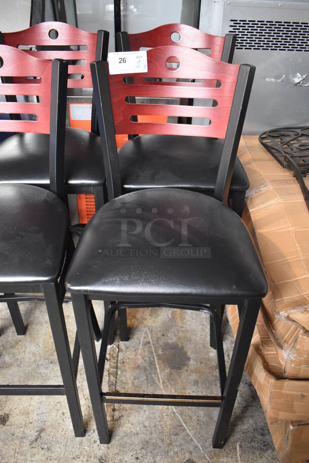 2 Black Metal Bar Height Chairs w/ Wood Pattern Back Rest and Black Seat Cushion. 18x18x43. 2 Times Your Bid!