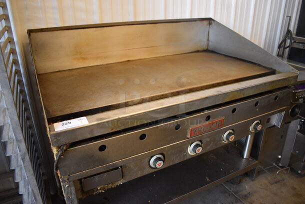 Vulcan Stainless Steel Commercial Natural Gas Powered Flat Top Griddle w/ Thermostatic Controls and Metal Under Shelf on Commercial Casters. 48x31x45.5 - Image 2 of 6