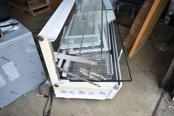BRAND NEW SCRATCH AND DENT! Avantco 360BCS60HCW 60" White Refrigerated Square Countertop Bakery Display Case with LED Lighting. See Pictures for Damage. Tested and Powers On But Does Not Get Cold - Image 3 of 8