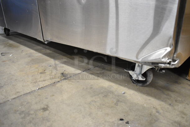 BRAND NEW SCRATCH AND DENT! 2024 Avantco 178APT71HC Stainless Steel Commercial 70" 3 Door Refrigerated Sandwich Prep Table on Commercial Casters. 115 Volts, 1 Phase. Tested and Working!  - Image 4 of 12