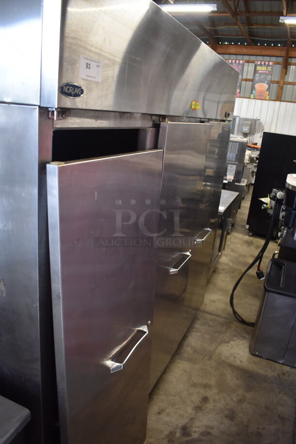 Norlake Commercial Stainless Steel 3 Solid Door Cooler With Polycoated Shelves. One Door Needs 
To Be Re-Attached. 115-230V.  - Image 2 of 7