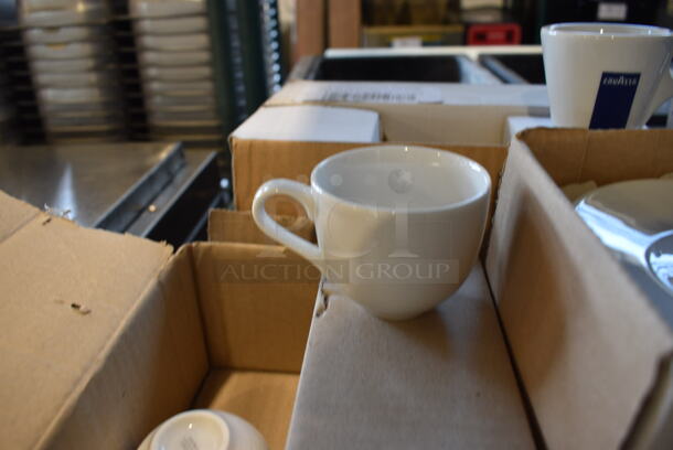 3 Various Boxes of White Ceramic Dishes; 6 White Ceramic Mugs, 12 Lavazza White Ceramic Mugs and 12 White Ceramic Saucers. Includes 5x5x1. 3 Times Your Bid! - Image 2 of 6