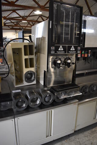 FBD Model FBD562 RC Stainless Steel Commercial Countertop 2 Flavor Slushie Machine on Stainless Steel Soda Station w/ 5 Cup Dispensers and 2 Doors. 215-245 Volts, 1 Phase. 36x42x77