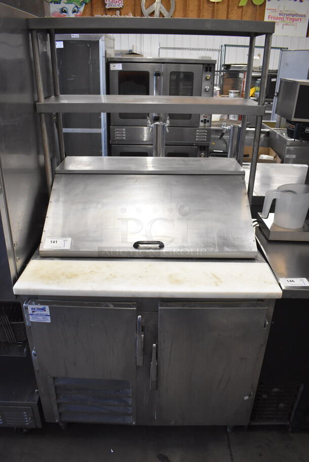 Leader Stainless Steel Commercial Sandwich Salad Prep Table Bain Marie Mega Top w/ 2 Tier Over Shelf and Various Drop In Bins. 115 Volts, 1 Phase. 36x32x70. Tested and Powers On But Temps at 48 Degrees