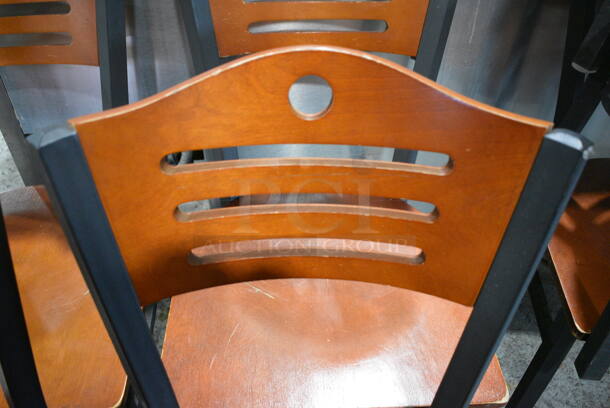 7 Wooden Dining Chairs w/ Black Metal Frame. Stock Picture - Cosmetic Condition May Vary. 17x17x33. 7 Times Your Bid! - Image 4 of 5