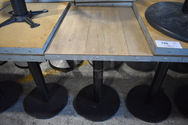 4 Wood Pattern Dining Table on Black Metal Table Bases. Stock Picture - Cosmetic Condition May Vary. 18x24x30.5. 4 Times Your Bid!