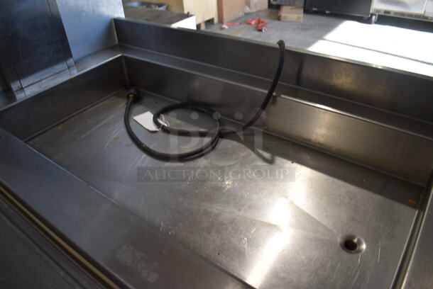Stainless Steel Commercial Floor Style Portable Buffet Station w/ Tray Slide on Commercial Casters. 52x40x55. Tested and Powers On But Does Not Get Cold - Image 3 of 5