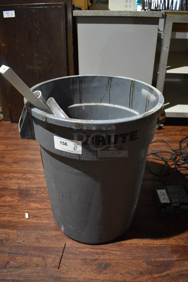 Rubbermaid Brute Gray Poly Trash Can w/ Contents. 25x22x27. (bar)