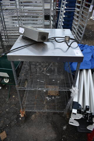 Stainless Steel Table w/ 2 Wire Under Shelves on Commercial Casters.