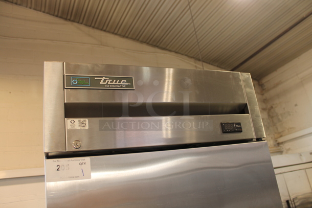 2018 True T-23-HC Stainless Steel Commercial Single Door Reach In Cooler w/ Poly Coated Racks on Commercial Casters. 115 Volts, 1 Phase. Tested and Working!
 - Image 2 of 6