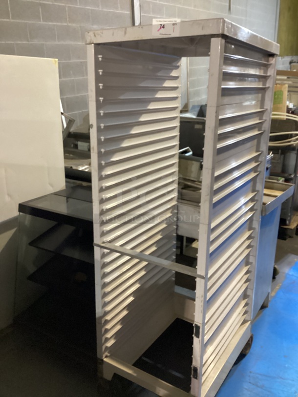 Plastic Bakers Rack.  21 x 29 x 68.
 - Image 1 of 4