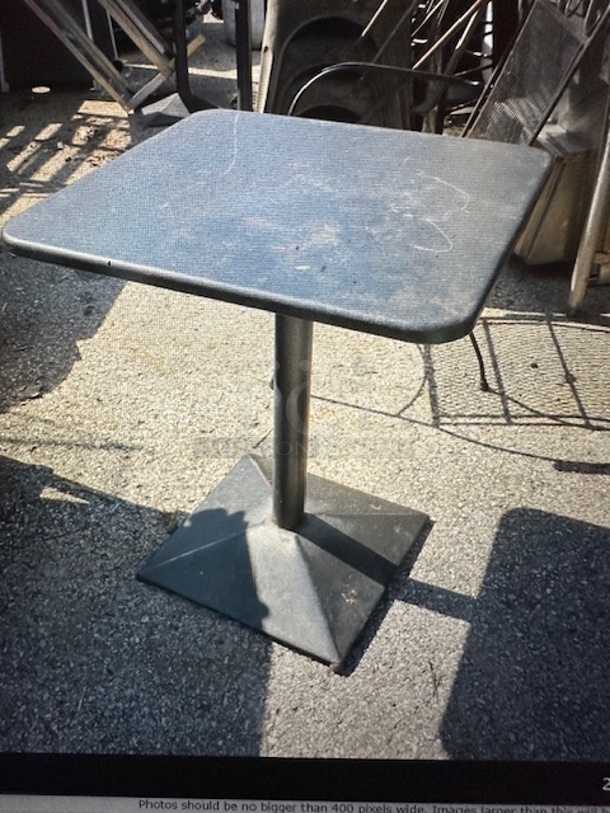 One Black Metal Indoor/Outdoor Adjustable Height Table. This Table Can Be Regular Or Bar Height! 24X24X29. 24X24X38.