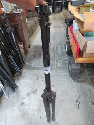 One Tripod Stand.
