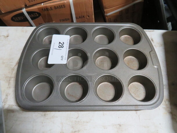 One 12 Hole Muffin Tin.  - Image 1 of 1