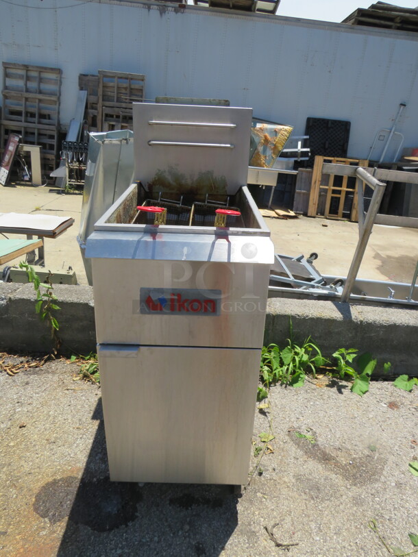 One Ikon Natural Gas Deep Fryer With 2 Baskets On Casters. WORKING WHEN REMOVED. Model# IGF-35140-NG. 15.5X30X40 - Image 1 of 4
