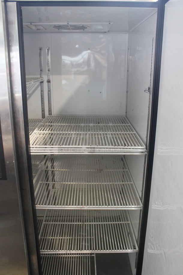 2014 True TG2R-2S ENERGY STAR Stainless Steel Commercial Two Door Reach In Cooler w/ Poly Coated Racks on Commercial Casters. 115 Volts, 1 Phase. Tested and Working! - Image 8 of 9