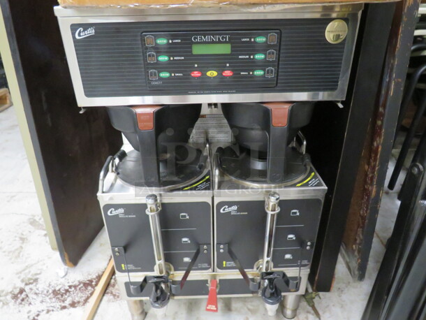 One Curtis Gemini GT Coffee Brewer With 2 Filter Baskets ANd 2 Satellites. 220 Volt. 1 Phase. 5200-7500 Watt. Model# GEMTS10A1005. $3133.16. - Image 1 of 1