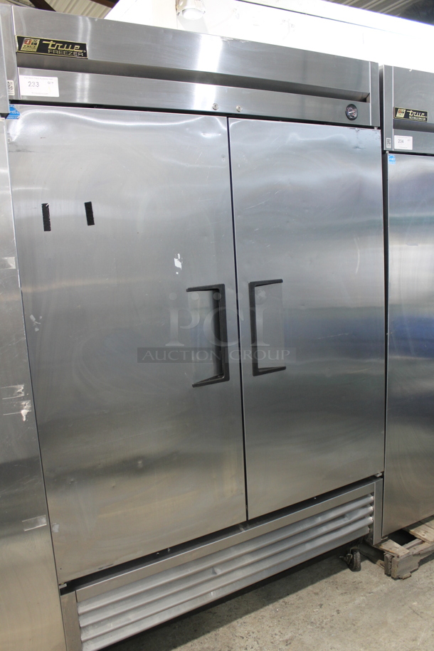 True Stainless Steel Commercial 2 Door Reach In Freezer w/ Poly Coated Racks on Commercial Casters. 115 Volts, 1 Phase. - Item #1099723