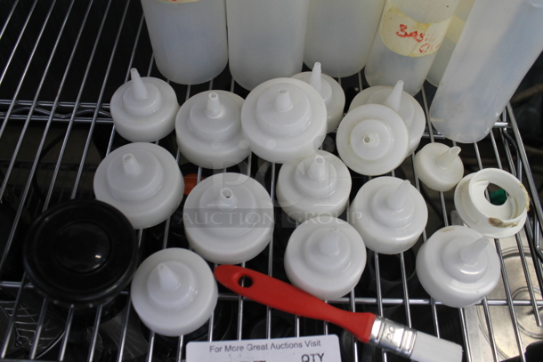 ALL ONE MONEY! Lot of Various Items Including Poly Condiment Bottles and Lids.  - Image 2 of 3