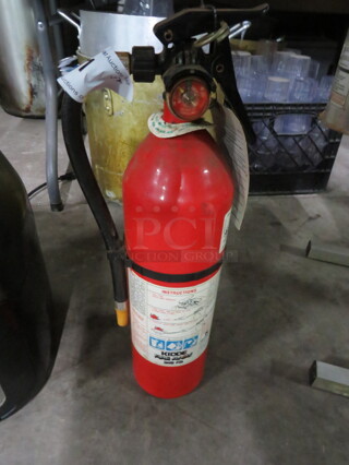 One Kidde ABC Fire Extinguisher.