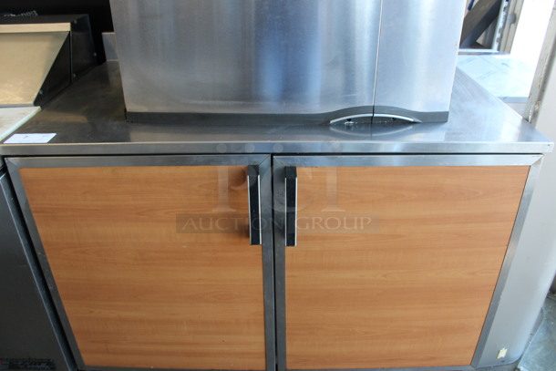 Duke Model RUF-48 Stainless Steel Commercial 2 Door Undercounter Cooler w/ Wood Pattern Doors on Commercial Casters. 120 Volts, 1 Phase. 48x30x40. Tested and Working!