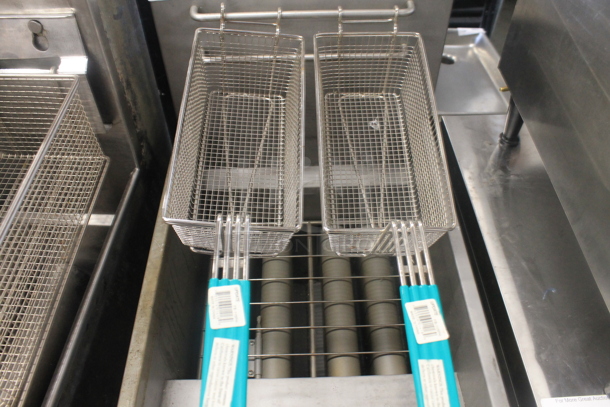 2021 Standard Range SR-F4-LP Stainless Steel Commercial Floor Style Propane Gas Powered Deep Fat Fryer w/ 2 Metal Fry Baskets. 120,000 BTU. - Image 4 of 6