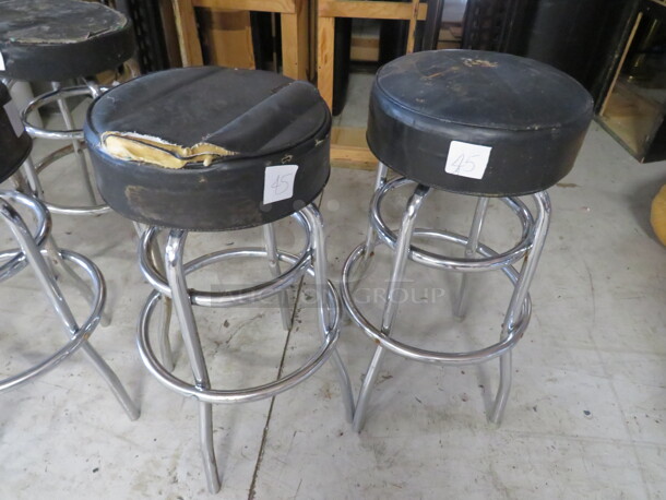 Double Chrome Ring Bar Stool With A Black Cushioned Swivel Seat. Need To Be Recovered. 2XBID - Image 1 of 1