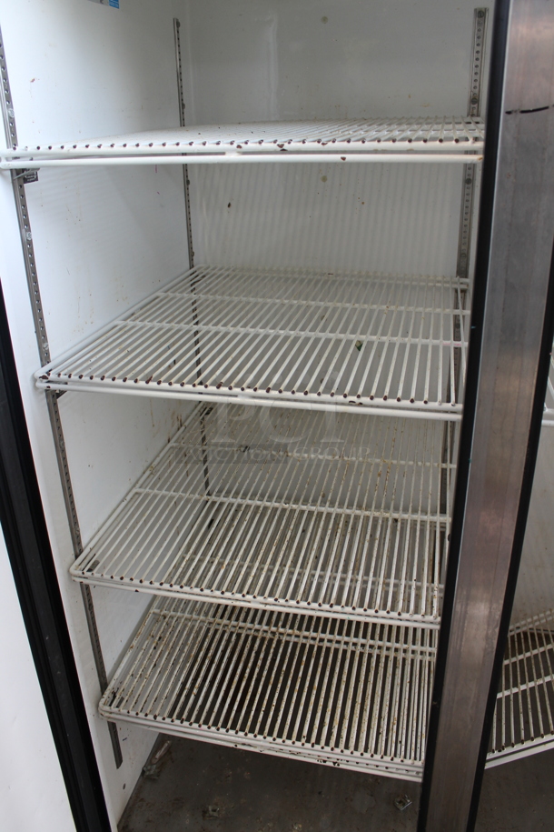 2014 True TG2R-2S ENERGY STAR Stainless Steel Commercial 2 Door Reach In Cooler w/ Poly Coated Racks on Commercial Casters. 115 Volts, 1 Phase. Tested and Working! - Image 2 of 4