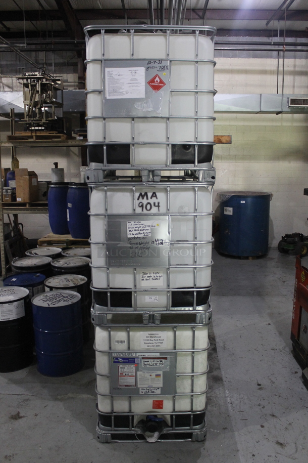 ALL ONE MONEY! Lot of 3 Poly Tanks in Metal Cage. BUYER MUST REMOVE.  - Image 1 of 5