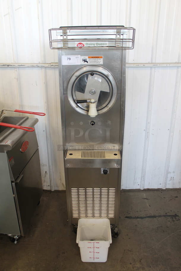 Dairy Queen Slush Machine on Commercial Casters w/ White Bin of Extra Parts. 115 Volts, 1 Phase. 