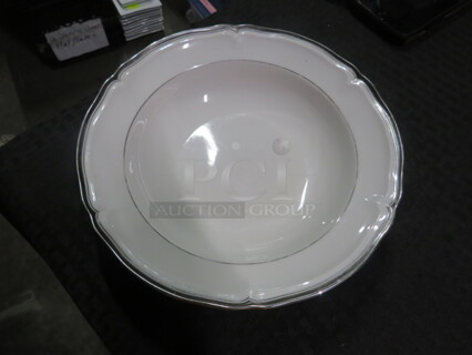 One 9 Inch Silver Rim Serve Bowl.