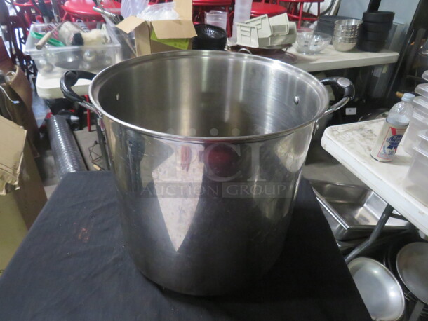 One 22 Quart Tramontina Stainless Steel Stock Pot. 