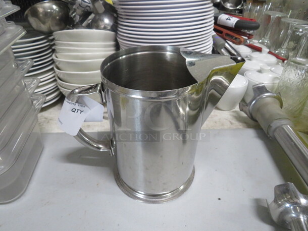 One Stainless Steel Vollrath 64oz Water Pitcher With Ice Guard. #46402. $35.99. 