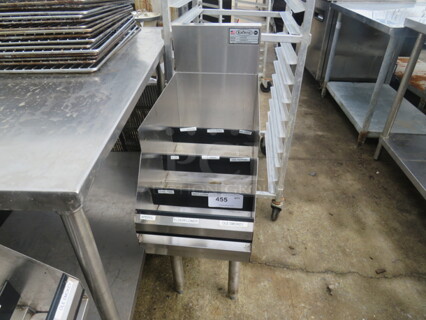 One Krowne SS 4 tier Bottle rack. #KP18-12RD. 12X24X37