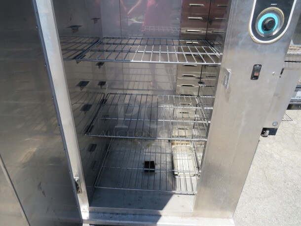 One WORKING Plate Mate Heated Holding Cabinet On Casters. 120 Volt. Model# HM84W. $8514.88. - Image 3 of 3