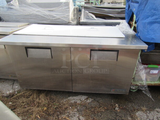 One TREU 2 Door Refrigerated Prep Table On Casters. Model# TSSU-60-24M. 115 Volt. 60X34X35