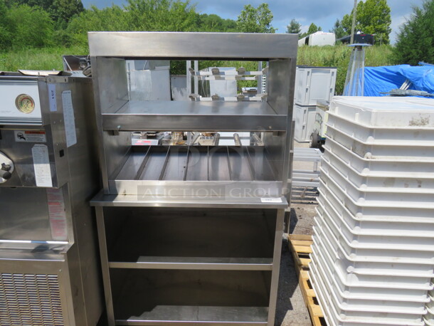 One Stainless Steel Work Station On Casters. 38X28X66