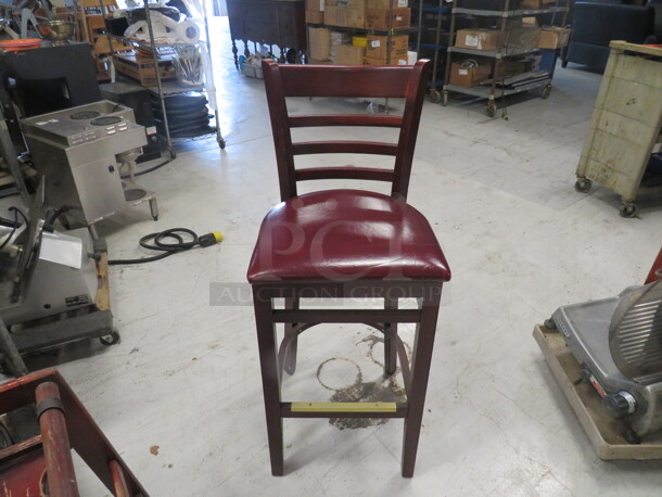 Wooden Bar Height Chair With Footrest And A Red Cushioned Seat. 2XBID