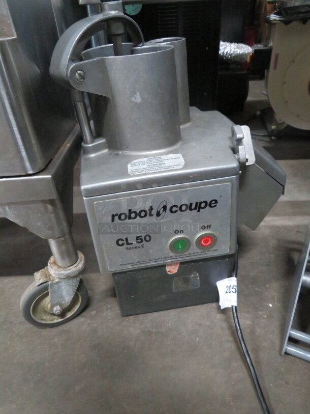 One Robot Coupe Continuous Feed Food Processor. #CL50. $4159.00