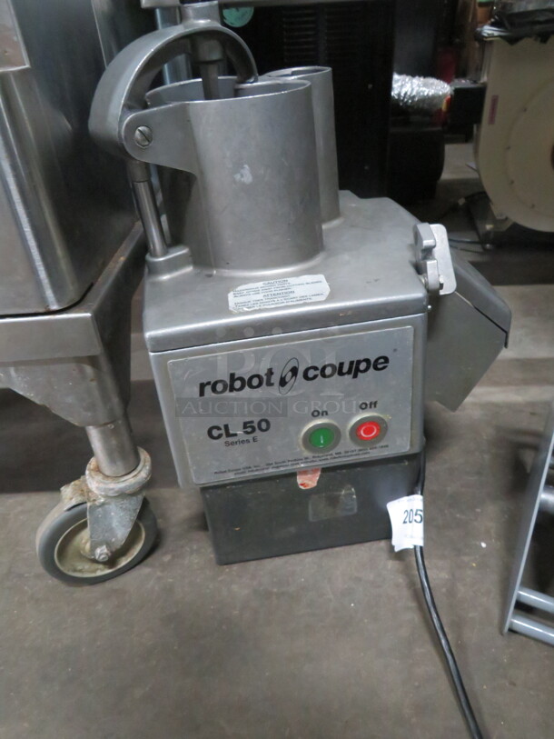One Robot Coupe Continuous Feed Food Processor. #CL50. $4159.00 - Image 1 of 3