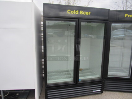 One TRUE 2 Door Glass Display Cooler With 8 Shelves. 115 Volt. Model# GDM-49-HC-TSL01. 54X30X78.5. Working Not Cold.