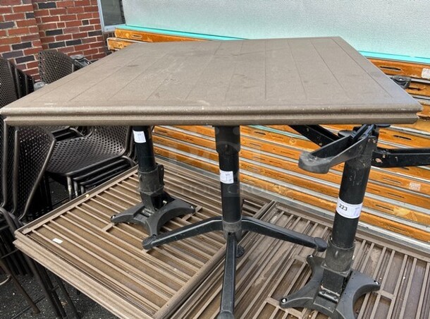 Brown Dining Height Outdoor Patio Table. Stock Picture - Cosmetic Condition May Vary. 35x35x30