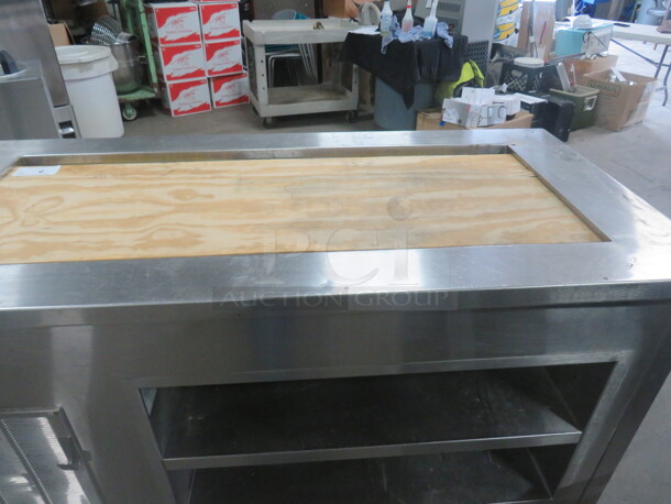 One Delfield Stainless Steel Serving Table With A 50X20X6 Well, And 2 Stainless Under Shelves, On Casters. 63X30X36  - Image 4 of 5