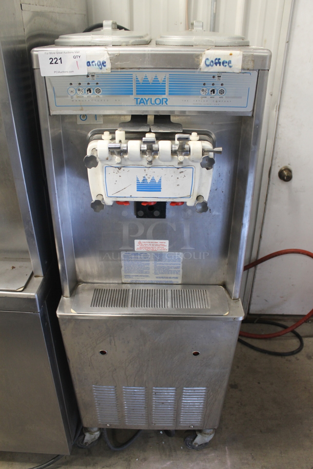 Taylor 794-27 Commercial Stainless Steel Electric Water Cooled Soft Serve Ice Cream Machine With 2 Hoppers On Commercial Casters. 208-230V, 1 Phase. 