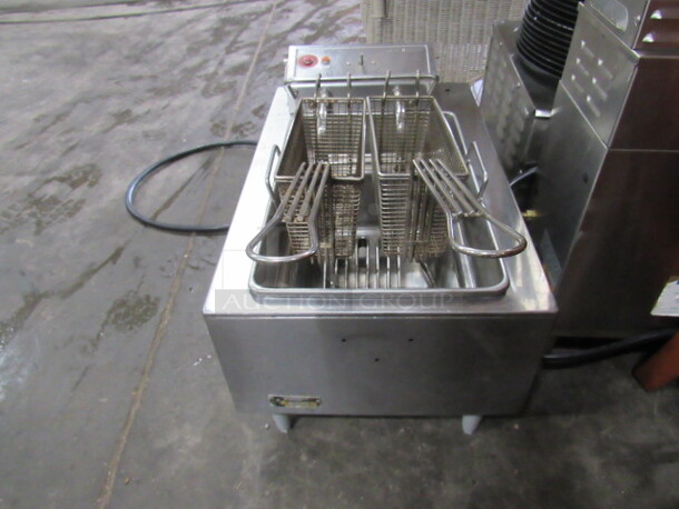 One Stainless Steel Wells Double Basket Table Top Deep Fryer. 208-240 Volt. 
