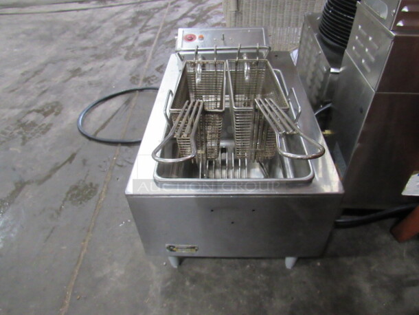One Stainless Steel Wells Double Basket Table Top Deep Fryer. 208-240 Volt.  - Image 1 of 4