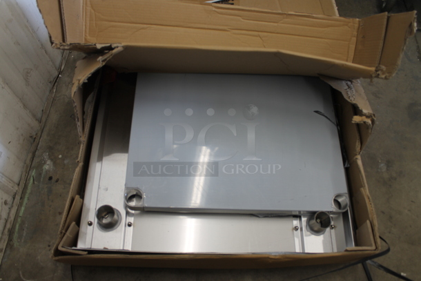 BRAND NEW SCRATCH AND DENT! Regency 600TSB3048S 30" x 48" 16-Gauge Stainless Steel Commercial Work Table with 4" Backsplash and Undershelf. Stock Picture Used as Gallery. - Image 3 of 3