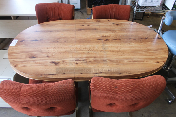 Wooden Dining Height Table w/ 4 Orange Dining Height Chairs on Metal Frame. 59x35x29, 18.5x22.5x33.5 - Image 1 of 5