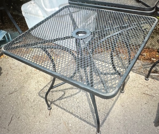 One Black Metal Patio Table With Umbrella Hole. 30X30X30 - Image 1 of 2