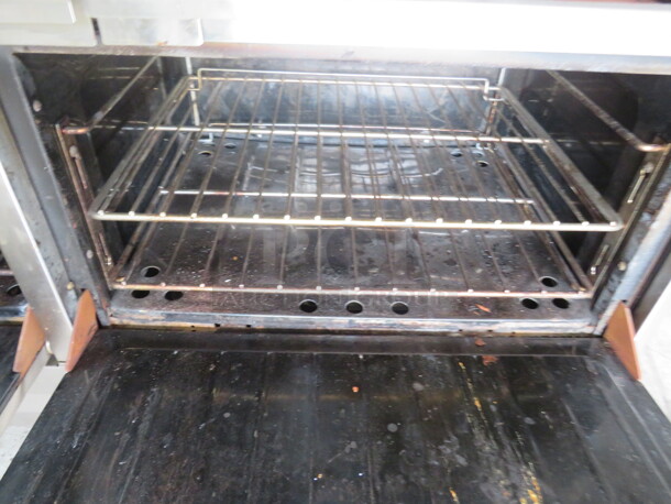 One Garland 6 Burner/24 Inch Griddle Natural Gas Range With 4 Racks, Over Shelf And Salamander. Model# H283. 60X33X59 - Image 4 of 6